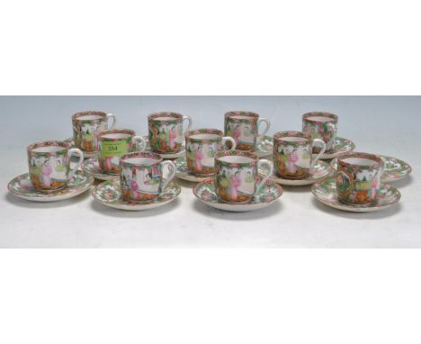 An early 20th Century Chinese republic period Canton ceramic tea set comprising of eleven small cups and saucers all having h