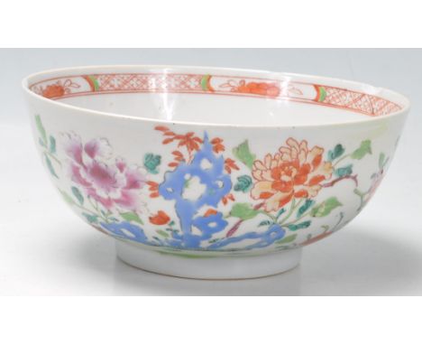 A Chinese 18th Century porcelain ceramic bowl having having enamelled floral decoration to the side featuring peonies having 