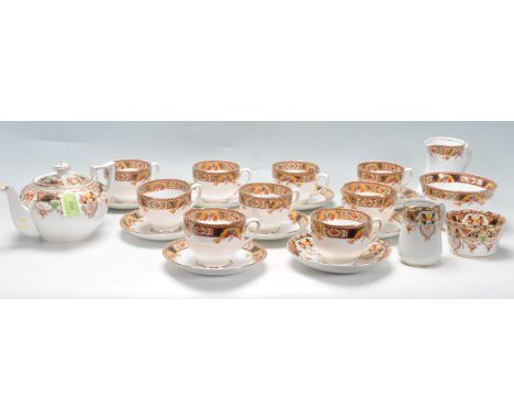 A 20th century Sausbury china / porcelain tea set. The tea set comprising of cups, saucers, creamer jug, sugar bowl, teapot, 