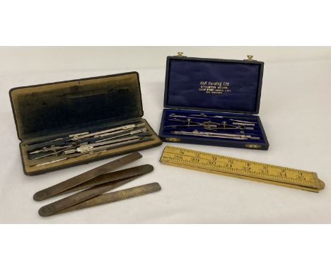 2 cased sets of scientific instruments, one by Hall Harding Ltd, London. Together with a wooden rule and a extending vintage 