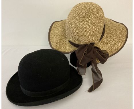 A vintage The "Con-Form" Wafer Hat, extra light - easy fitting, Long Oval. Supplied by T Wright, Complete Outfitter, East Der