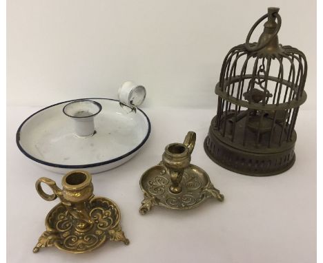 A small collection of assorted  metal ware items. Comprising: a brass birdcage ornament, an enamel chamber candlestick and 2 