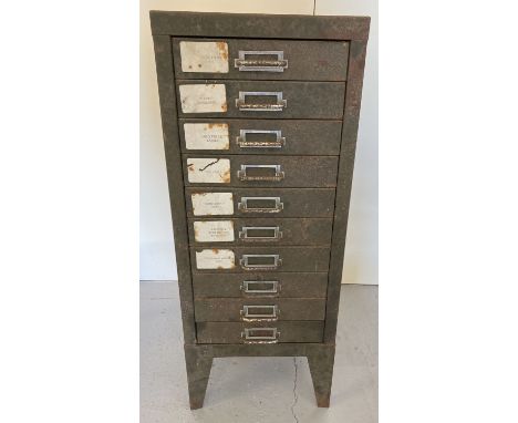 A vintage metal storage cabinet with 10 slim drawers. With original green paintwork. Approx. 29cm wide x 39cm deep x 73cm tal