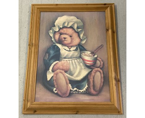 A large pine framed &amp; glazed print of a teddy bear. Approx. 73.5cm x 58cm.