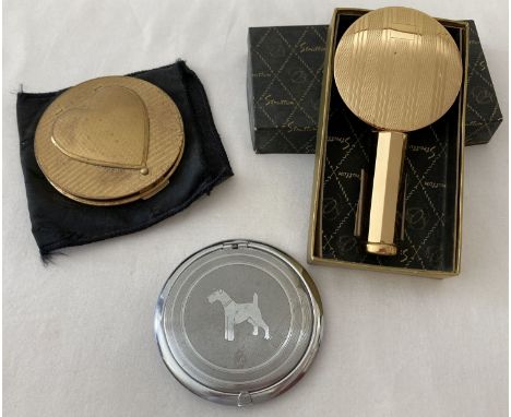 2 vintage Stratton compacts together with a boxed unused lipstick holder with mirror by Stratton. Compacts comprise: a silver