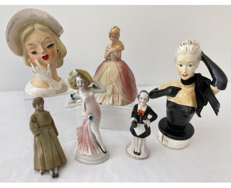 A collection of ceramic and plaster vintage lady figurines. To include a burlesque style bottle/jar stopper and a D.R.G.M. fi