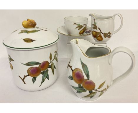 4 pieces of Royal Worcester "Evesham" ceramics. Comprising: a large lidded jar, large water jug, milk jug and breakfast cup a