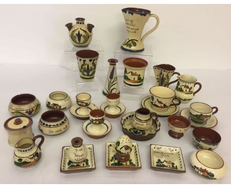 A box of assorted vintage motto ware Torquay pottery items to include Scandy and cockerel patterns. Lot includes: cups &amp; 