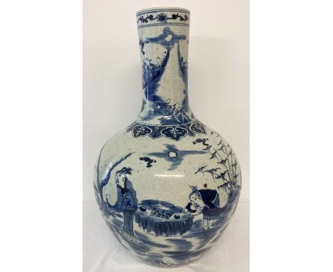 A very large ceramic, hand painted blue and white vase with figural and scenic design. Of bulbous form, with straight neck. A