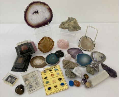 A collection of assorted gemstones and  minerals to include slices and cased polished stones. Lot includes: rose quartz, amet