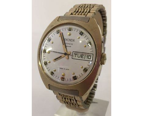 A Vintage Sekonda Automatic day and night, gold tone watch. With day/date box. In working order.