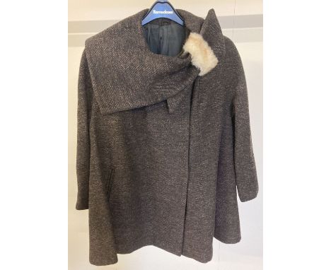 A vintage 1960's A line style brown wool jacket with white fur collar fixing by Harick Originals. Fully lined. Chest approx. 