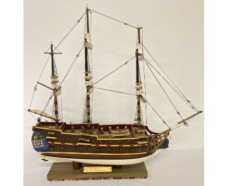 A handmade wooden scale model of a 18th century 32 gun frigate. With detailed masts, sails and body. Ship, lanterns, rigging,