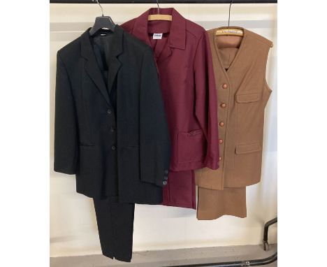 3 ladies vintage trouser suits. A black button front single breasted jacket with matching tapered trousers. A brown wool butt