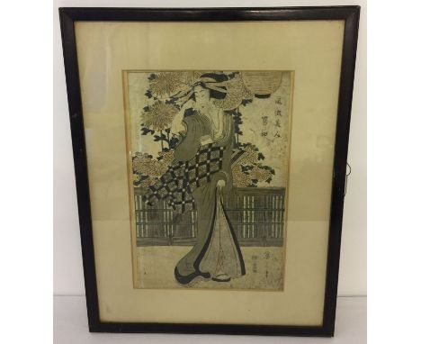 A framed and glazed 19th century Japanese signed wood block print depicting an oriental lady. Frame size approx. 51.5 x 40.5c