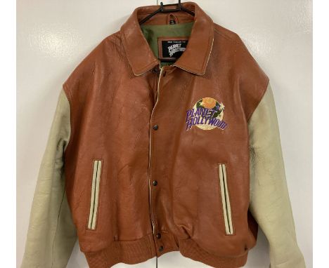 A vintage brown and cream leather "Planet Hollywood" bomber jacket. Large embroidered logo to back "Planet Hollywood London" 