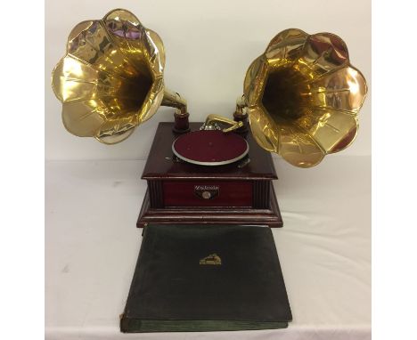 A reproduction wooden cased twin horn gramophone marked "Victrola". Complete with handle. Together with a vintage His Master 