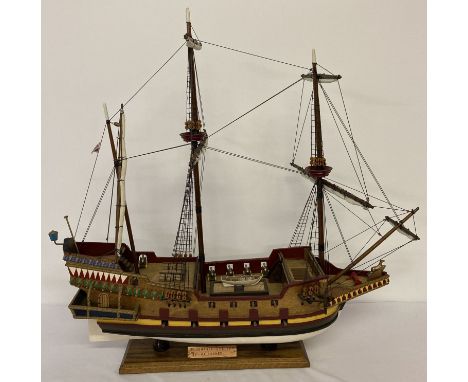 A handmade wooden scale model of a 16th century galleon with 20 guns.Detailed masts, rigging, sails and deck areas. Hand pain