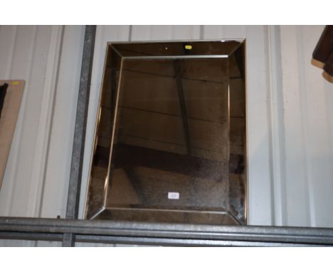 A bevel edged wall mirror 