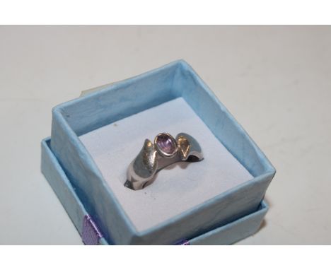A vintage Sterling silver and amethyst set ring, ring size J/K