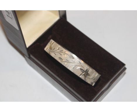 A 1977 Jubilee marked Sterling silver bangle approx. 29gms