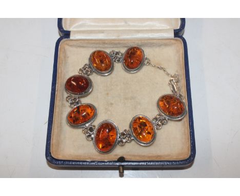 A vintage Sterling silver and amber set bracelet, approx. 22.5gms