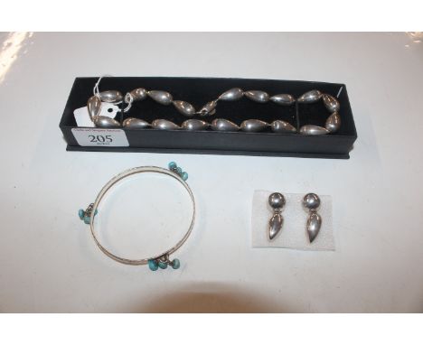 A 925 silver bangle with turquoise coloured stones and a 925 silver necklace and pair of ear-rings 