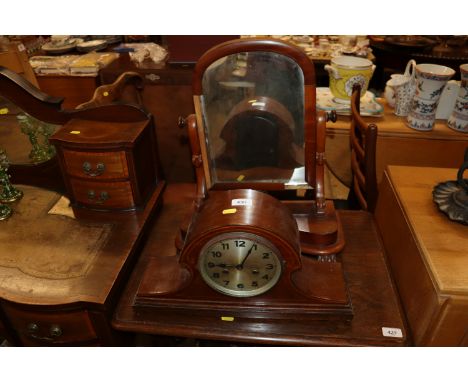 A Victorian mahogany swing toilet mirror together with an early 20th Century mahogany cased mantel clock