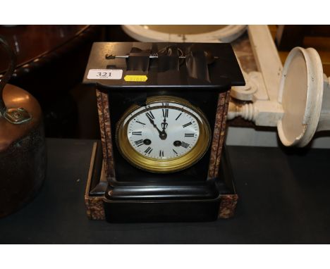 A marble and slate two hole mantel clock 