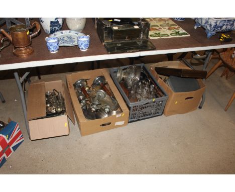 Four boxes containing a large quantity of silver plated ware including cutlery, various cased sets of cutlery,. a pedestal bo