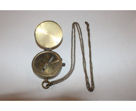 A brass cased compass 