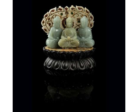 青玉雕三世佛（一組三件） each Buddha carved seated in padmasana, both hands in dhyana mudra holding a wish fulfilling gem, backed with a 