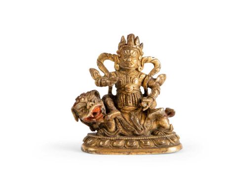 清 銅鎏金寶財天王座像 the Guardian of the North is cast seated upon a snarling fierce lion, holding a mongoose in his left hand, right 