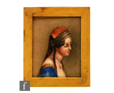 A 19th Century portrait watercolour miniature head and shoulder study of a young woman wearing an Arab style headdress, 9cm x