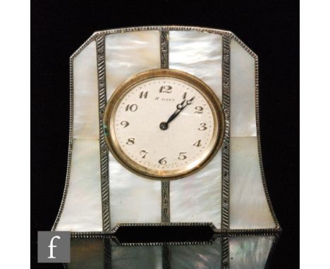 An Art Deco hallmarked silver small easel clock, Arabic numerals to a circular silvered dial within mother of pearl panel and