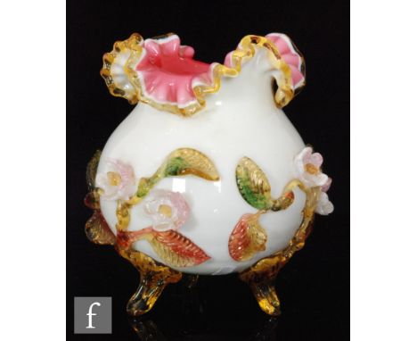 A late 19th Century Bolton &amp; Mills glass posy bowl of globular form with flared frill rim, opal cased over pink and decor