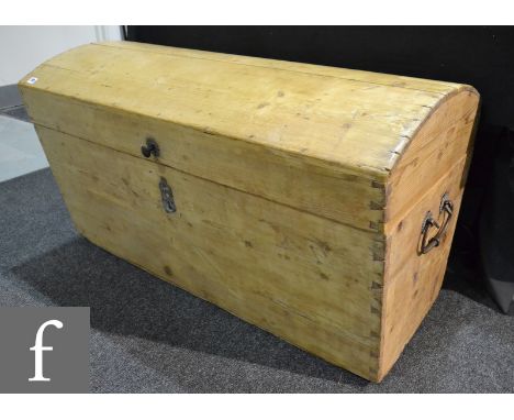 A late 19th to early 20th Century Scandinavian pine dome topped trunk, with twin iron handles and lift out internal tray, hei
