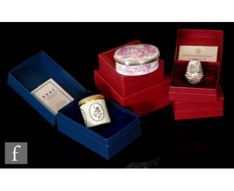 A collection of six enamel pill or patch boxes by Halycon Days and Staffordshire Enamels, mostly decorated with flora and fau
