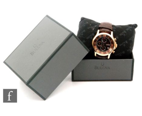 A gentleman's Bulova progressive copper Chronograph watch to a leather strap with box and papers. 