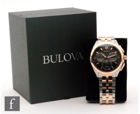 A gentleman's Bulova Curv 98A160 Two Tone Chronograph Bracelet Watch with box and papers. 