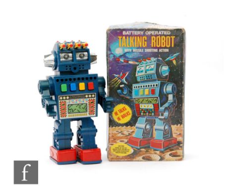 An AC (Hong Kong) Battery Operated Talking Robot, in blue and red plastic with four missiles, height 29cm, contained in pictu