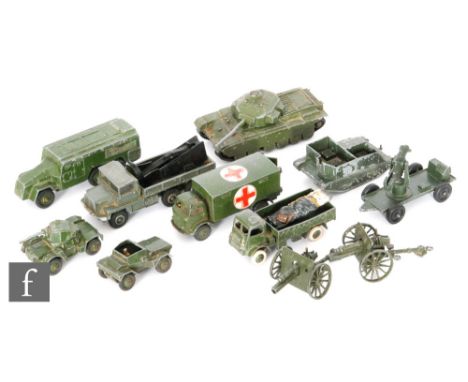 A collection of playworn Dinky military diecast models, to include #626 Military Ambulance with stretcher, #623 Army Wagon et