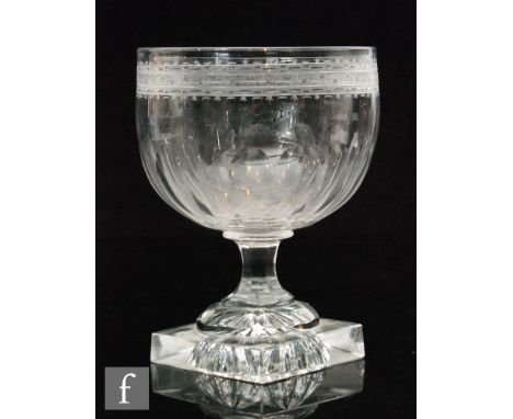 A large late 18th Century rummer, ovoid bowl with upper engraved border above basal slice cut detail and slice cut waisted st