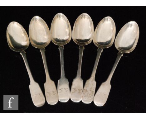 A set of six Victorian Irish silver fiddle pattern dessert spoons with engraved crests to terminals, total weight 8oz, Dublin