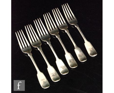 A set of six Victorian hallmarked silver fiddle pattern dessert forks, engraved crest to terminals, total weight 8oz, London 