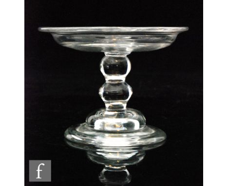 An 18th Century patch stand with a shallow circular dish raised to a double bobbin stem and domed and folded foot, height 6.5