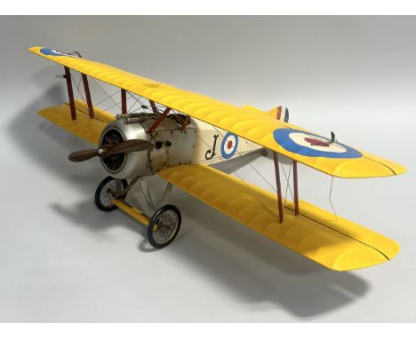 ENTERTAINMENT MEMORABILIA: A MODEL OF A WORLD WAR I BI-PLANE FROM 'GULLIVER'S TRAVELS'75cm D