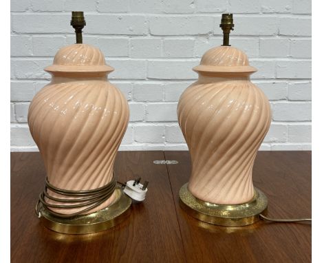 A PAIR OF PINK GLAZED CERAMIC TABLE LAMPS44cm H