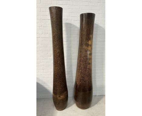A PAIR OF LARGE TREE TRUNK SCULPTURESTallest 205cm H