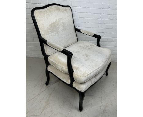 A FRENCH FAUTEUIL WITH EBONISED FRAME, NEUTRAL VELVET UPHOLSTERED BACK AND SEAT95cm x 95cm x 70cm